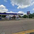 Truck crashes into pole at gas station