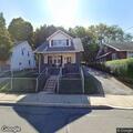 Car hits gas main causing building gas leak