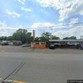 Disabled pickup partially blocking roadway