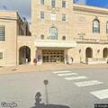 Person suffering heat stroke in front of theater