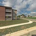 Solicitor going door to door at town center apartments
