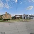 Car with flat tires after pothole on Worthington Avenue