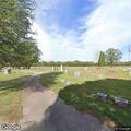 Officer checks on man walking near cemetery