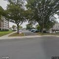 Person experiencing severe back pain near Long Branch