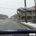 Traffic stop at Econo Lodge on blue Chevy Equinox