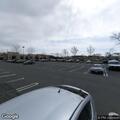 Driver reports car bumper contact in parking lot