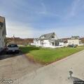 Neighbor dispute over yard work on Roslyn Street