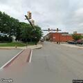 Intoxicated man on ground at Main Street address