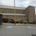 Man possibly having panic attack in car near church