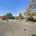 Person experiencing abdominal pain at Ocean Avenue