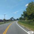Car facing wrong way in traffic lane