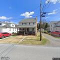 Person with severe back pain near Plummer Road