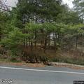 Low wires partially blocking lane on Spook Lane
