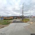 Vehicle stuck on railroad tracks with driver inside