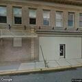 Person with back injury at police headquarters