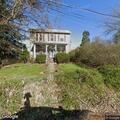 80-year-old male falls outdoors and remains injured