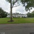 Tree damages house on Broadmoor Drive