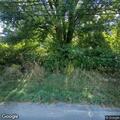 Report of tree blocking lane on state road