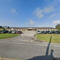 Person with abdominal pain at care center near Maplewood