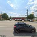 White hatchback speeding on Brady toward University