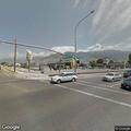 Traffic light flashing red at major intersection
