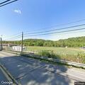Medical helicopter landing at football stadium in Smith Township