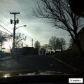 Officer checks suspicious vehicle by library