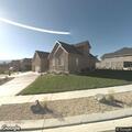 Person with chest pain and breathing issues at home