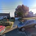 Tree falls on car and porch on Lindberg Avenue