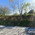 Man falls down embankment with possible broken ankle