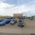 Officers check vehicle linked to auto dealership