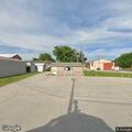 Man reported laying near business on South Main Street