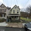 Hanging live wires create road hazard on Watkins Avenue