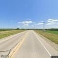 Flooded roadway on US 150 east of Downs