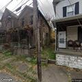 Abandoned house collapsing on Cliff Street
