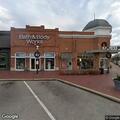 Car hits light pole near Bath & Body Works