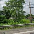 Tree down on wires on Pizza Barn Road