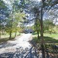 Suspicious voices heard in woods behind home