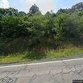 Motorcyclist pinned with leg injury on Piney Ridge Rd