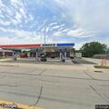 Woman found unresponsive in car at gas station