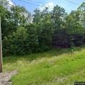 Power pole and lines reported on fire near home