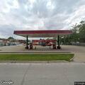 Person experiencing chest pain at convenience store parking lot
