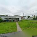 Person experiencing back pain at North Mechanic Street