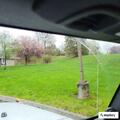 Woman in car reports possible collision in driveway
