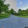 Person experiencing severe back pain in Bethel Township