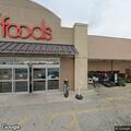Vehicle strikes pedestrian at grocery store