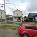 Two men fighting in backyard, one taken into custody