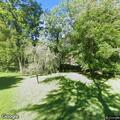 Tree blocking roadway near residence