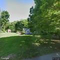 Injured deer reported in yard on East 11th Street