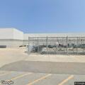 Male found lying partially on cart and ground at Walmart